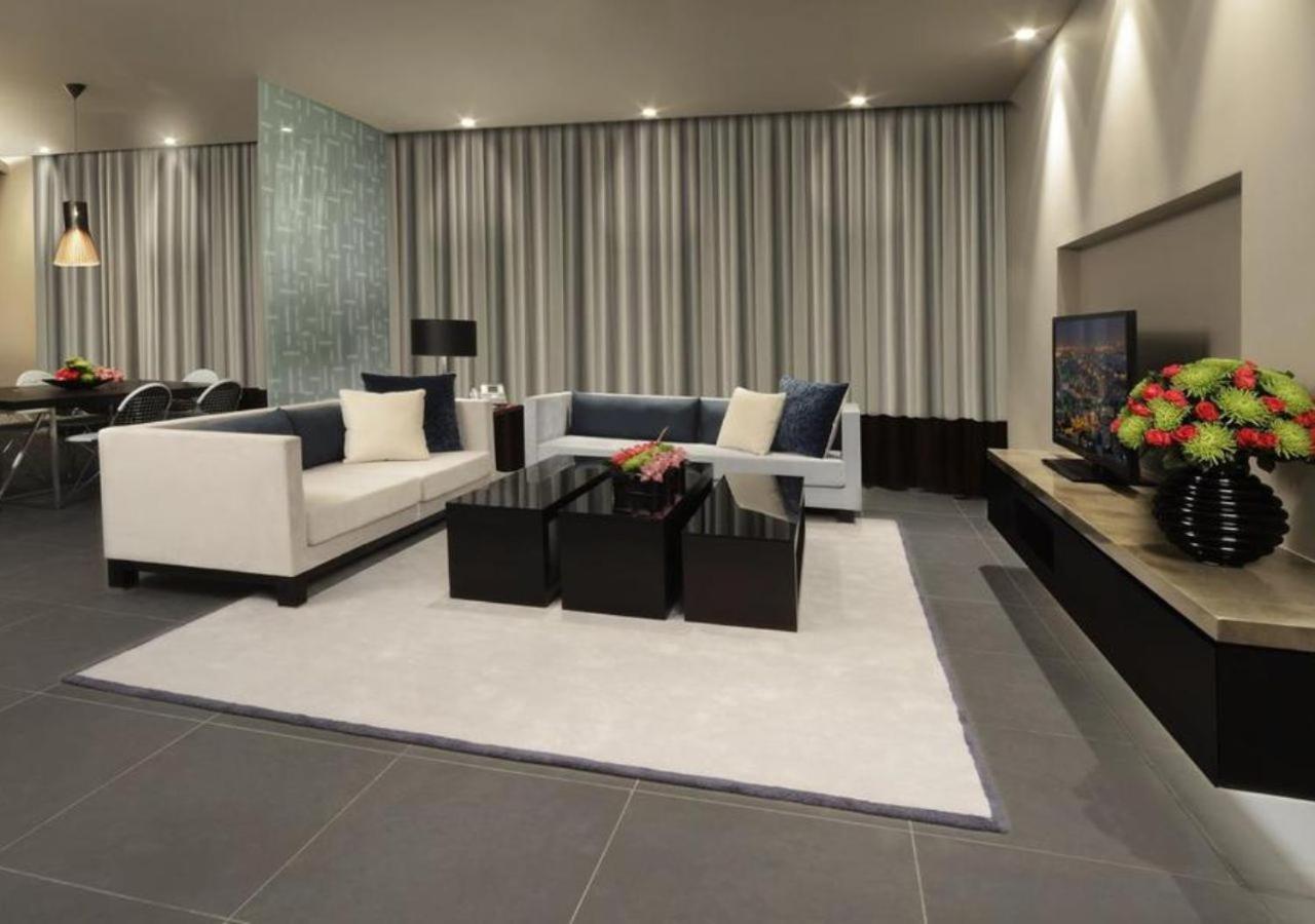 The Abdali Boulevard Hotel Amman Exterior foto A living room