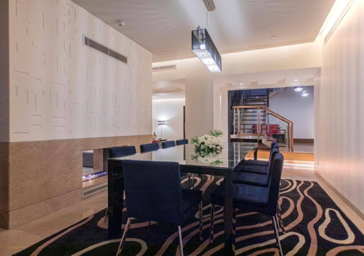 The Abdali Boulevard Hotel Amman Exterior foto A modern dining room